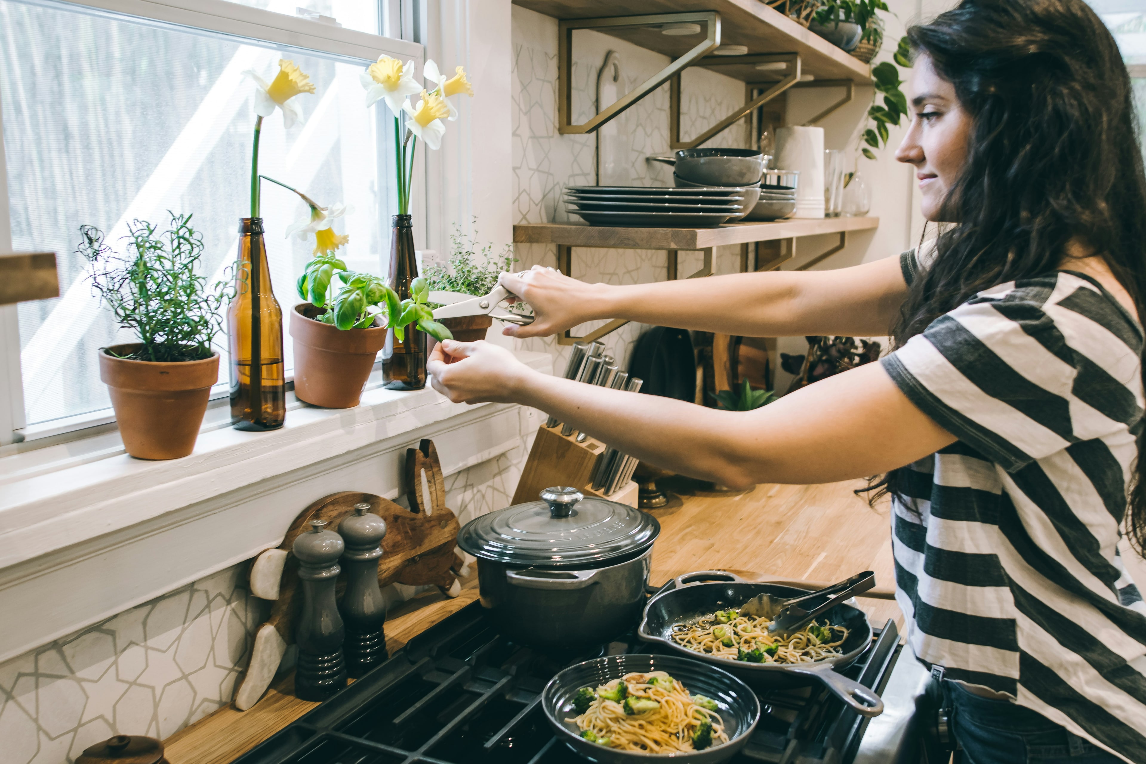 A person preparing a healthy meal in a kitchen