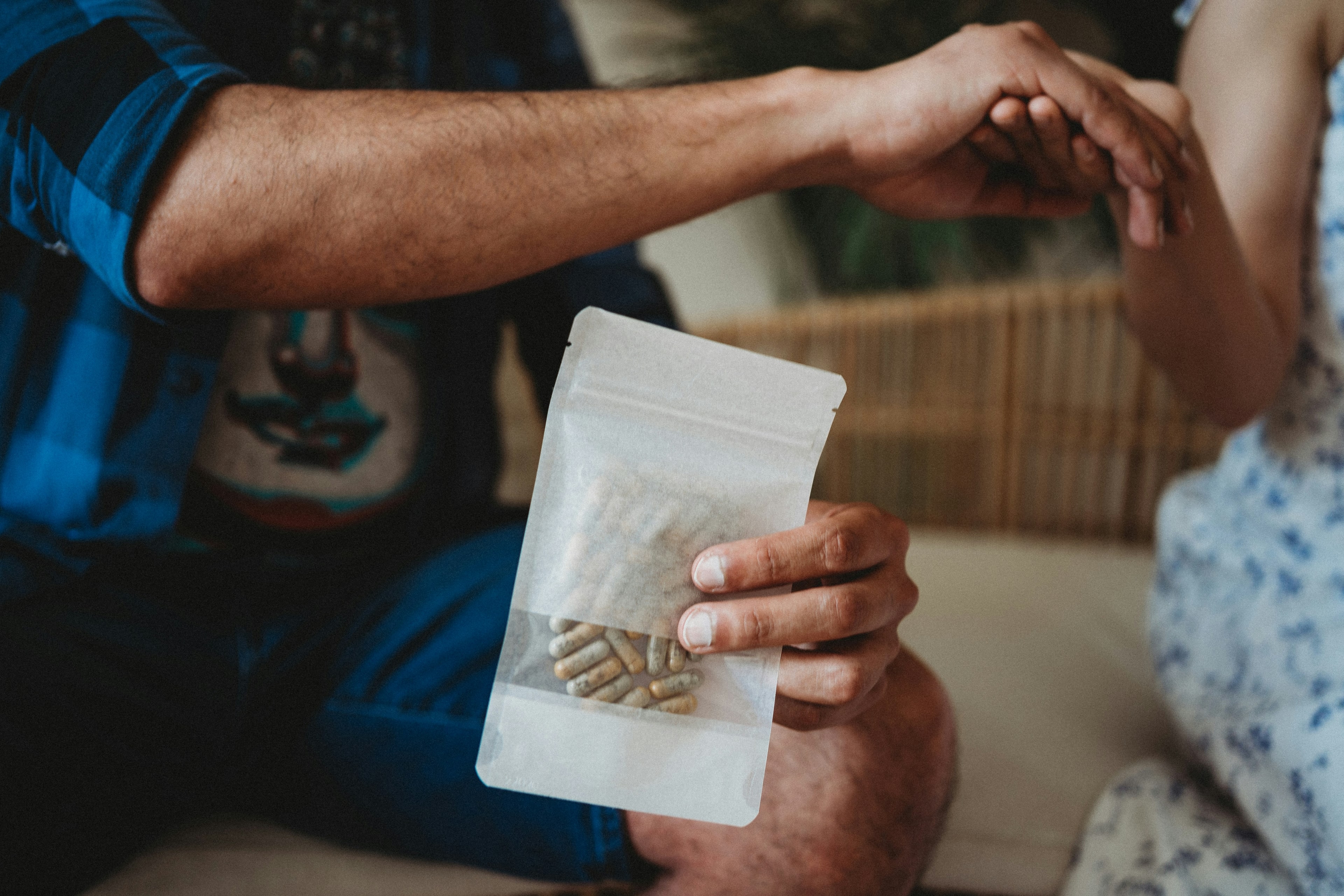 A care professional reviewing medication in a calm setting