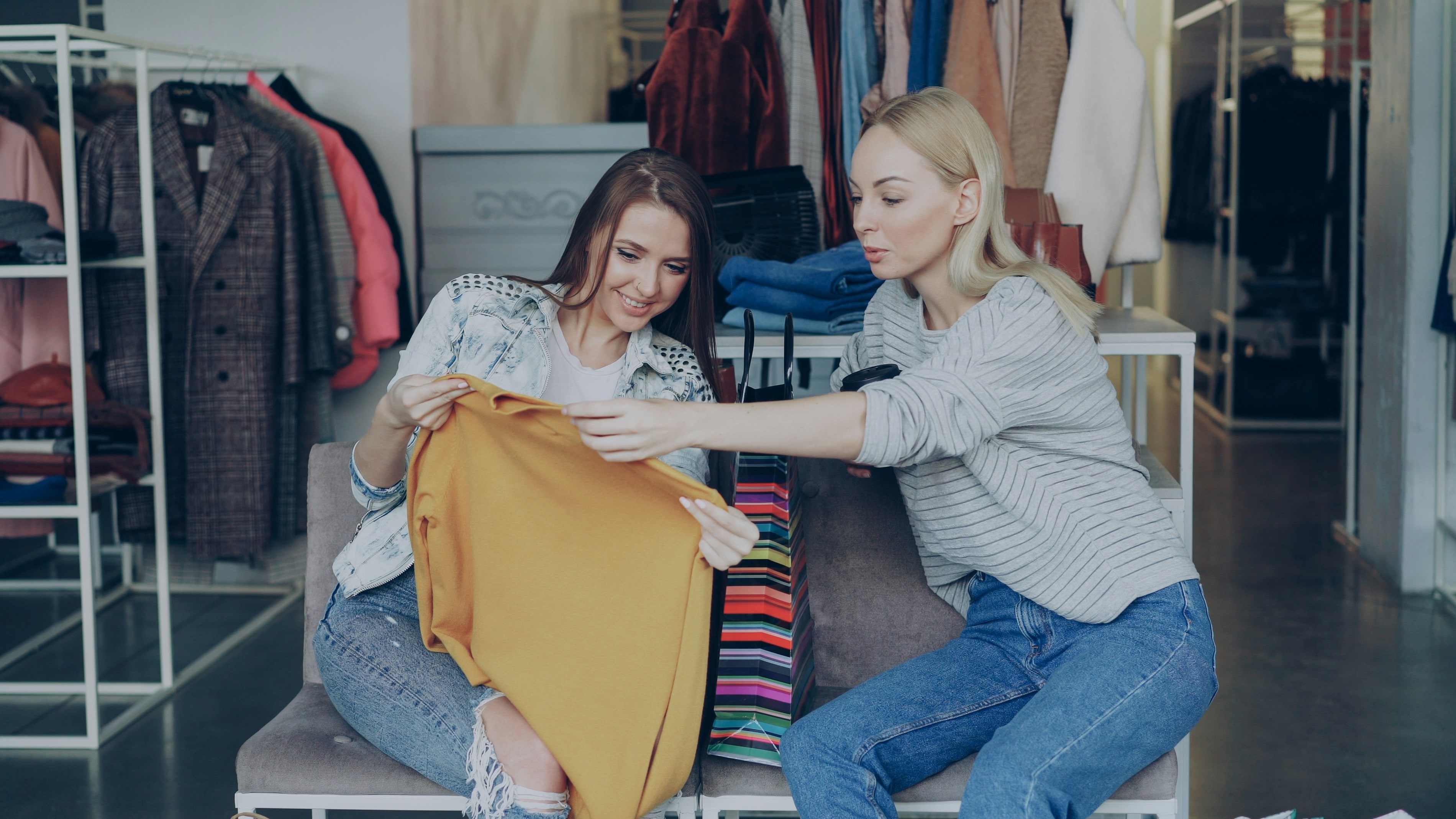 A support worker and resident sharing an easy domestic moment at home