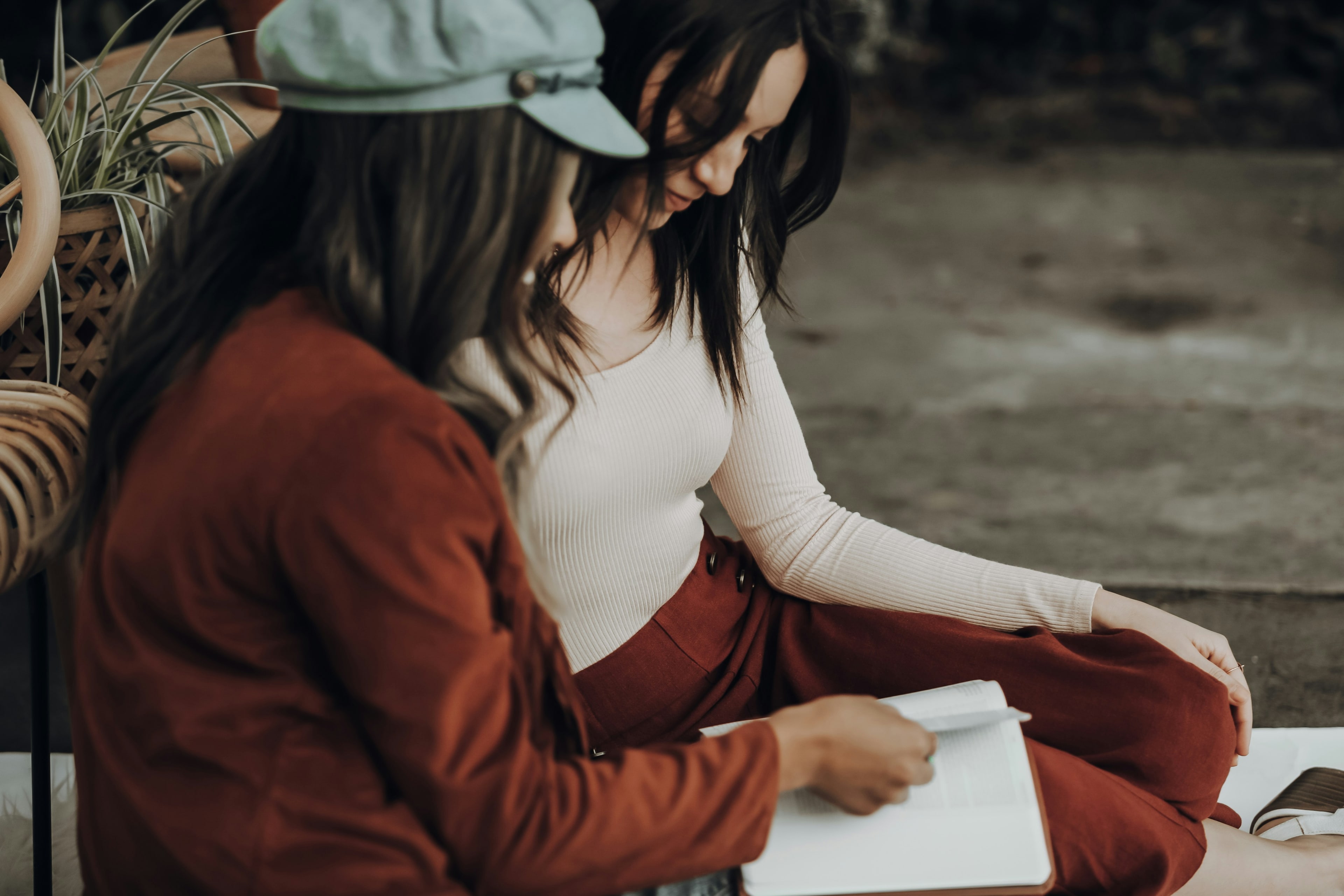 A support worker and resident building a support plan together at a table