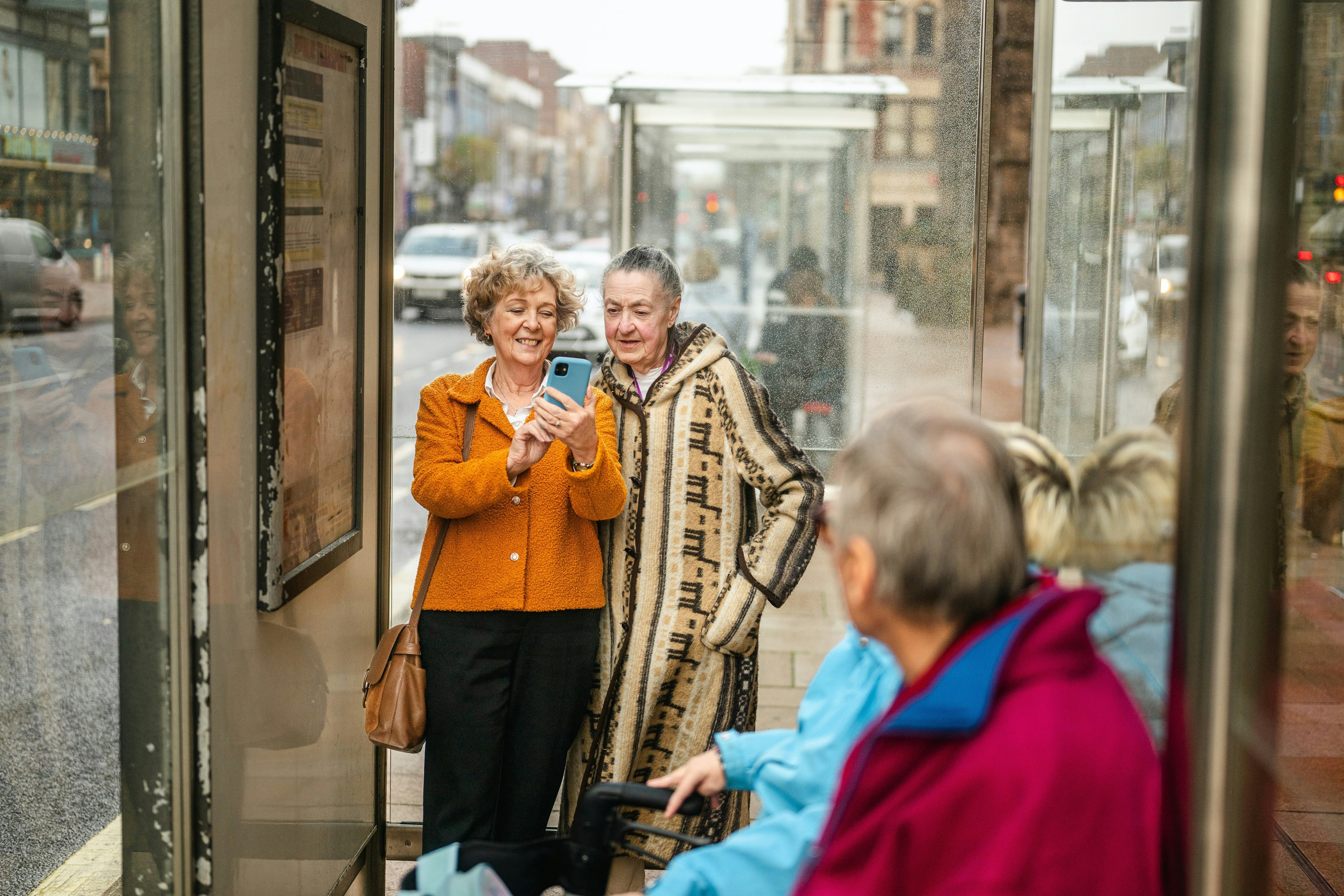 A support worker and resident working together on a practical life skill